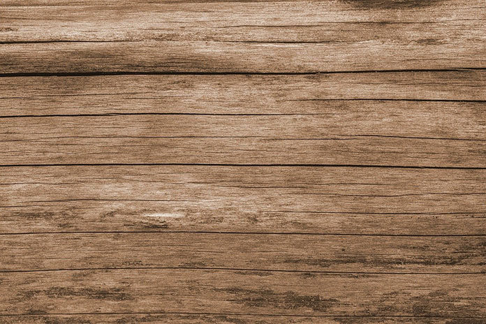 Dlaczego warto wybrać litą drewnianą deskę podłogową